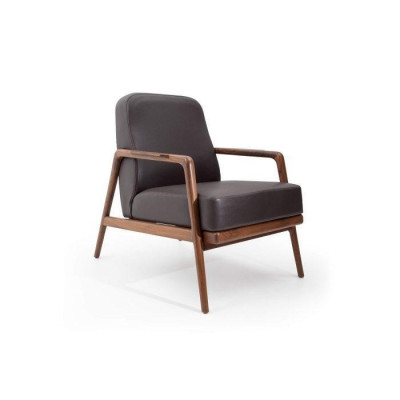  Design-Akkzent: Sessel in Trendfarbe mit schlichtem Holzrahmen neu